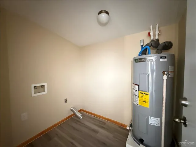 a view of storage and utility room with washer and dryer