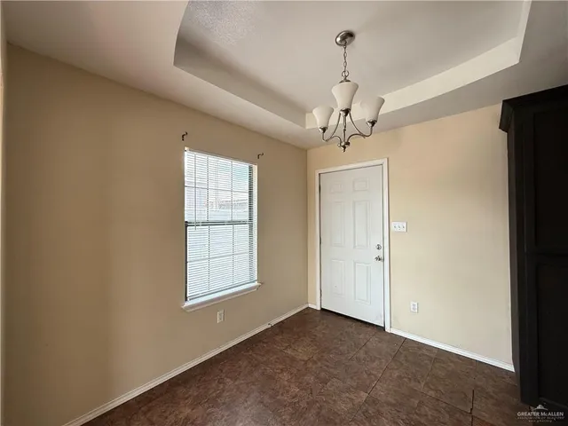 a view of a chandelier in a room