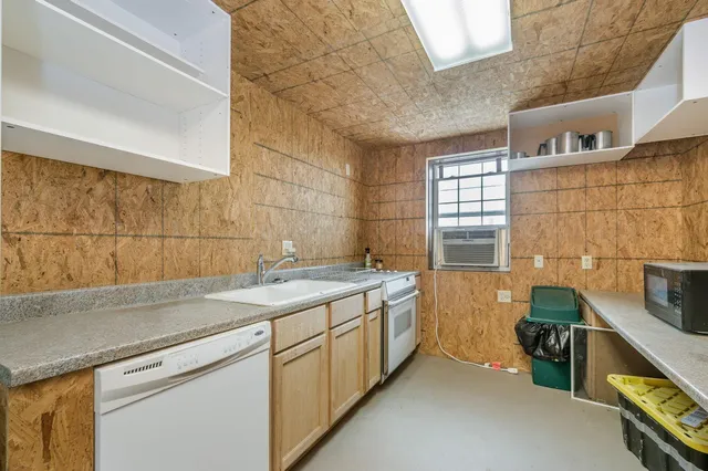 a house with a yard and garage