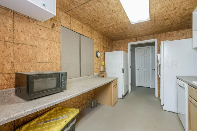 a view of a swimming pool and an outdoor seating