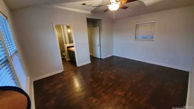 a view of entryway with wooden floor