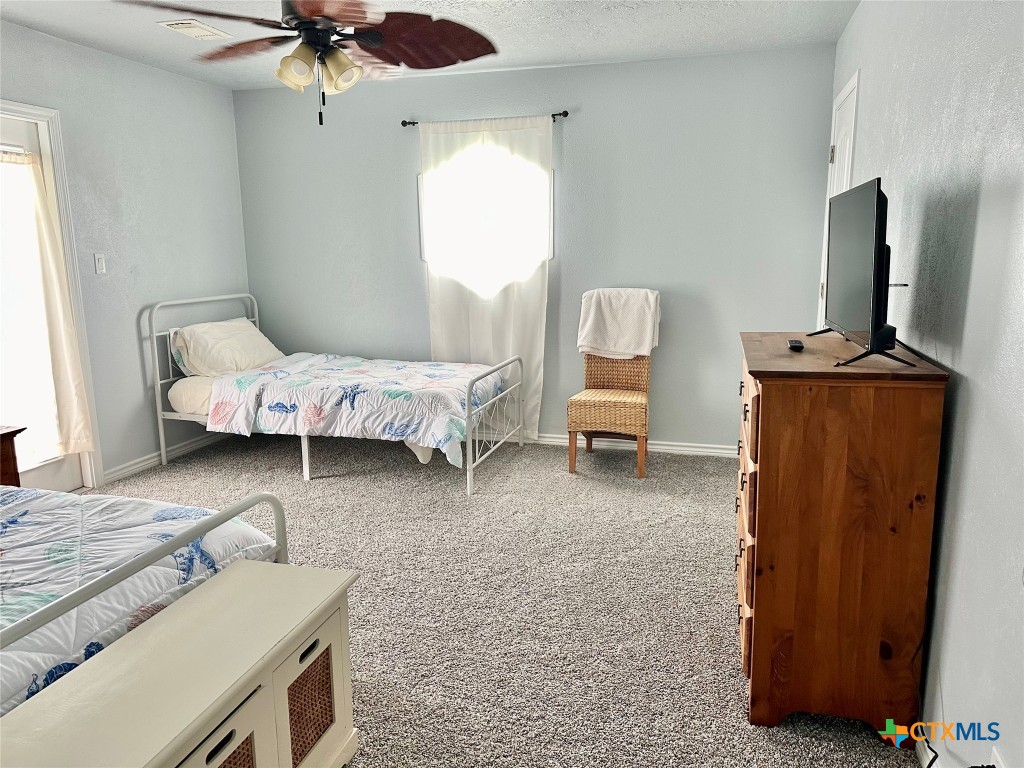 3109 Diane Street Port Bolivar, TX 77650 - Photo 11 of 17 a living room with furniture and a window