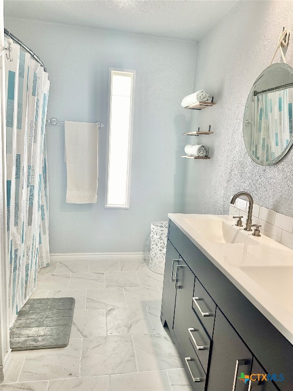 3109 Diane Street Port Bolivar, TX 77650 - Photo 16 of 17 a bathroom with a sink and a mirror