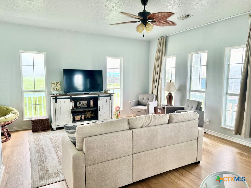3109 Diane Street Port Bolivar, TX 77650 - Photo 4 of 17 a living room with furniture and a flat screen tv