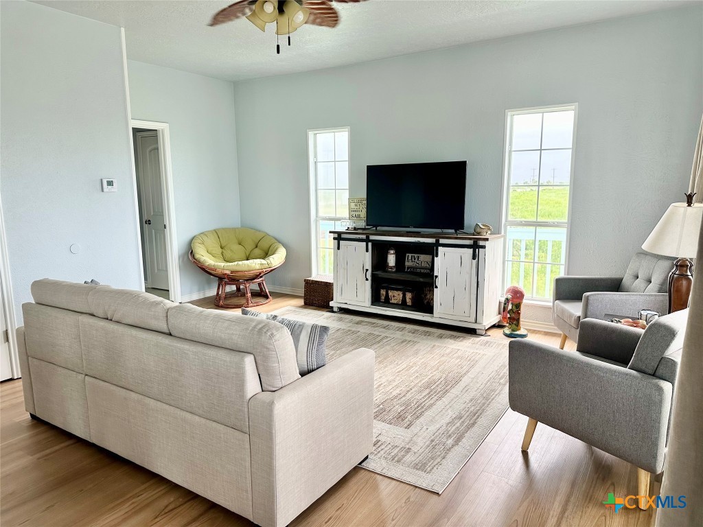 3109 Diane Street Port Bolivar, TX 77650 - Photo 5 of 17 a living room with furniture and a flat screen tv