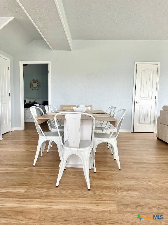 3109 Diane Street Port Bolivar, TX 77650 - Photo 7 of 17 a view of a dining room with furniture and wooden floor