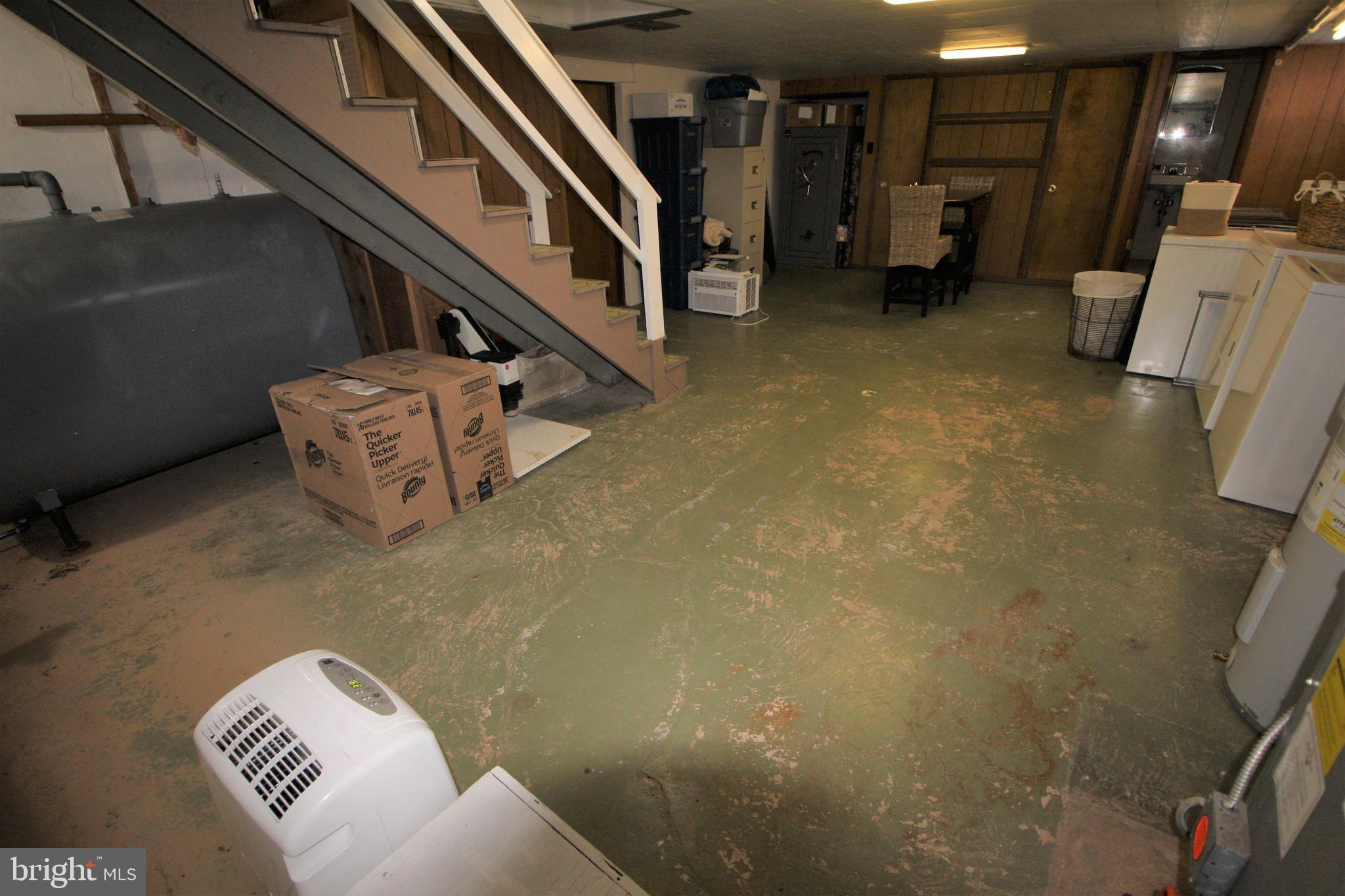 2057 Bergey Road Hatfield, PA 19440 - Photo 22 of 24 Unfinished basement with half bath & new oil tank