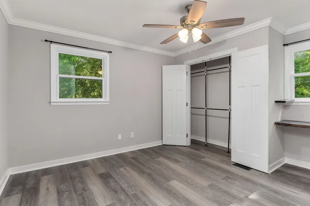 a bathroom with a sink a shower and a mirror