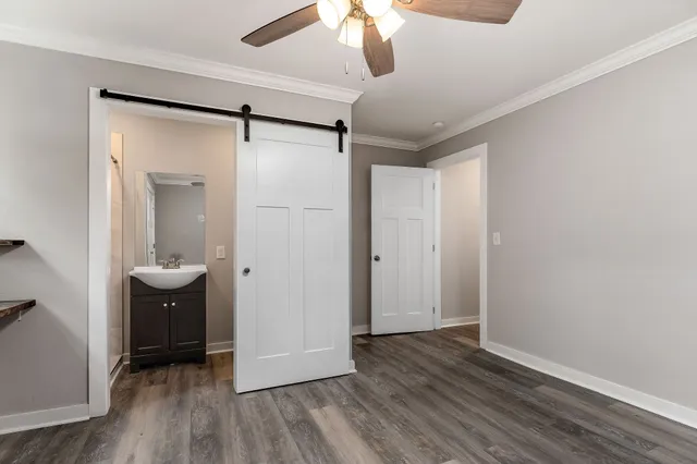 a view of backyard with a deck