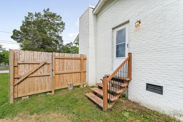 a view of a pool with a yard