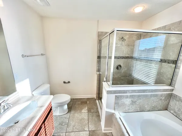 a view of a yard with a house