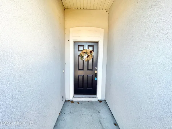 a view of an entryway of a house