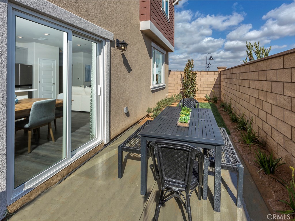 28285 Via Garnicia Temecula, CA 92591 - Photo 11 of 14 a balcony with table and chairs
