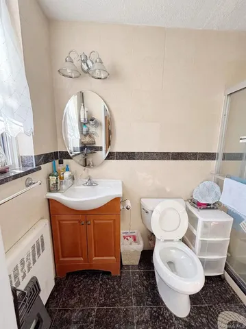 a bathroom with a sink and a toilet