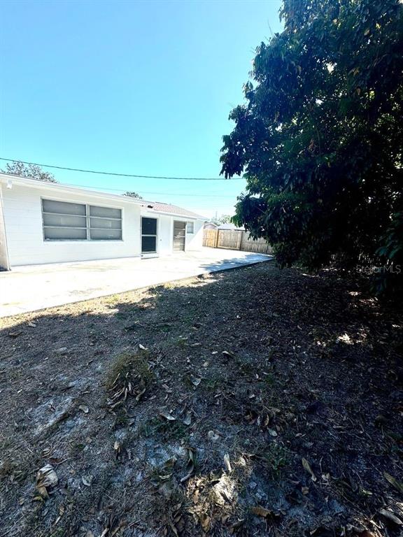 1019 Pert Lane Holiday, FL 34691 - Photo 11 of 12 a house view with a outdoor space