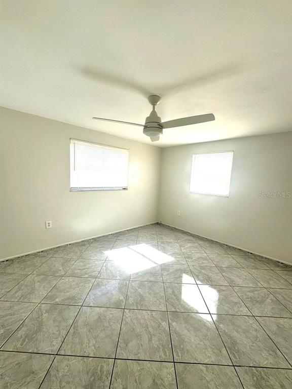 1019 Pert Lane Holiday, FL 34691 - Photo 5 of 12 a view of an empty room and window