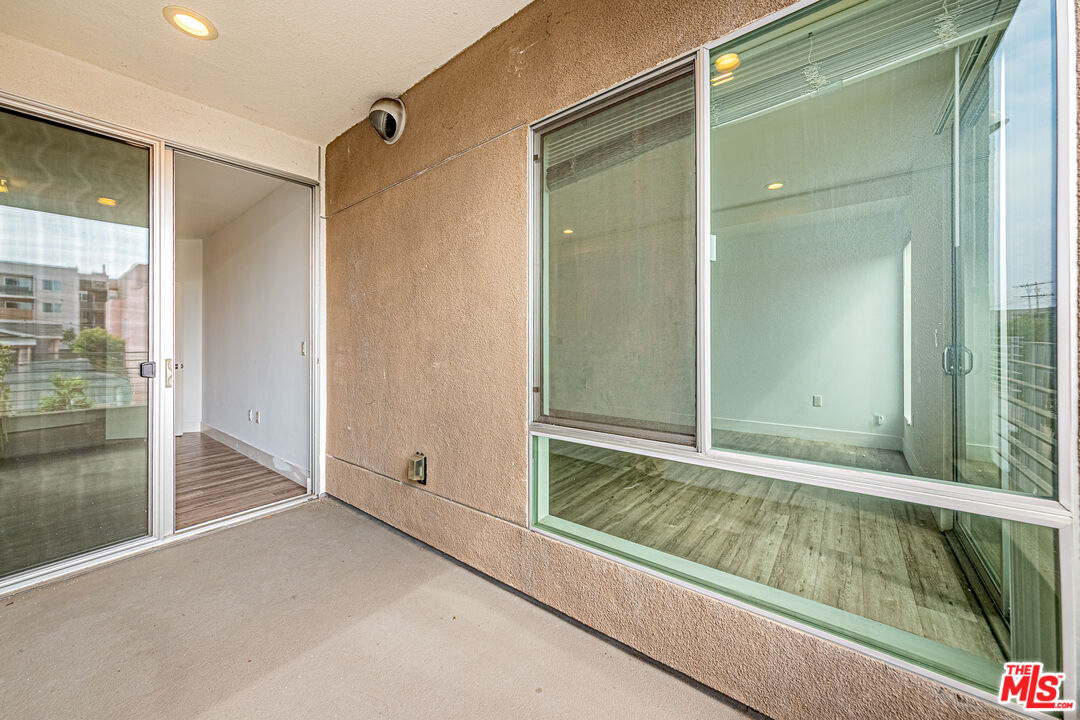 1101 South Harvard Boulevard, Unit 303 Los Angeles, CA 90006 - Photo 20 of 44 a view of room with window