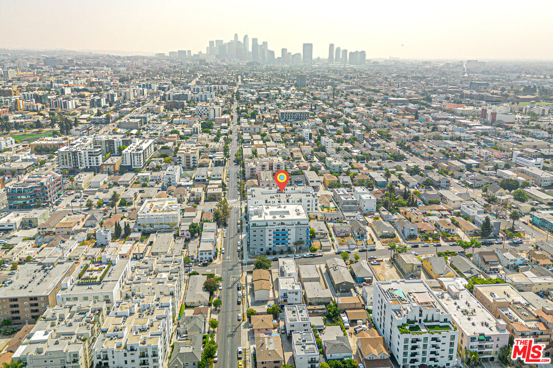 1101 South Harvard Boulevard, Unit 303 Los Angeles, CA 90006 - Photo 44 of 44 an aerial view of residential houses with city view
