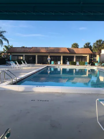 a front view of building with lake view