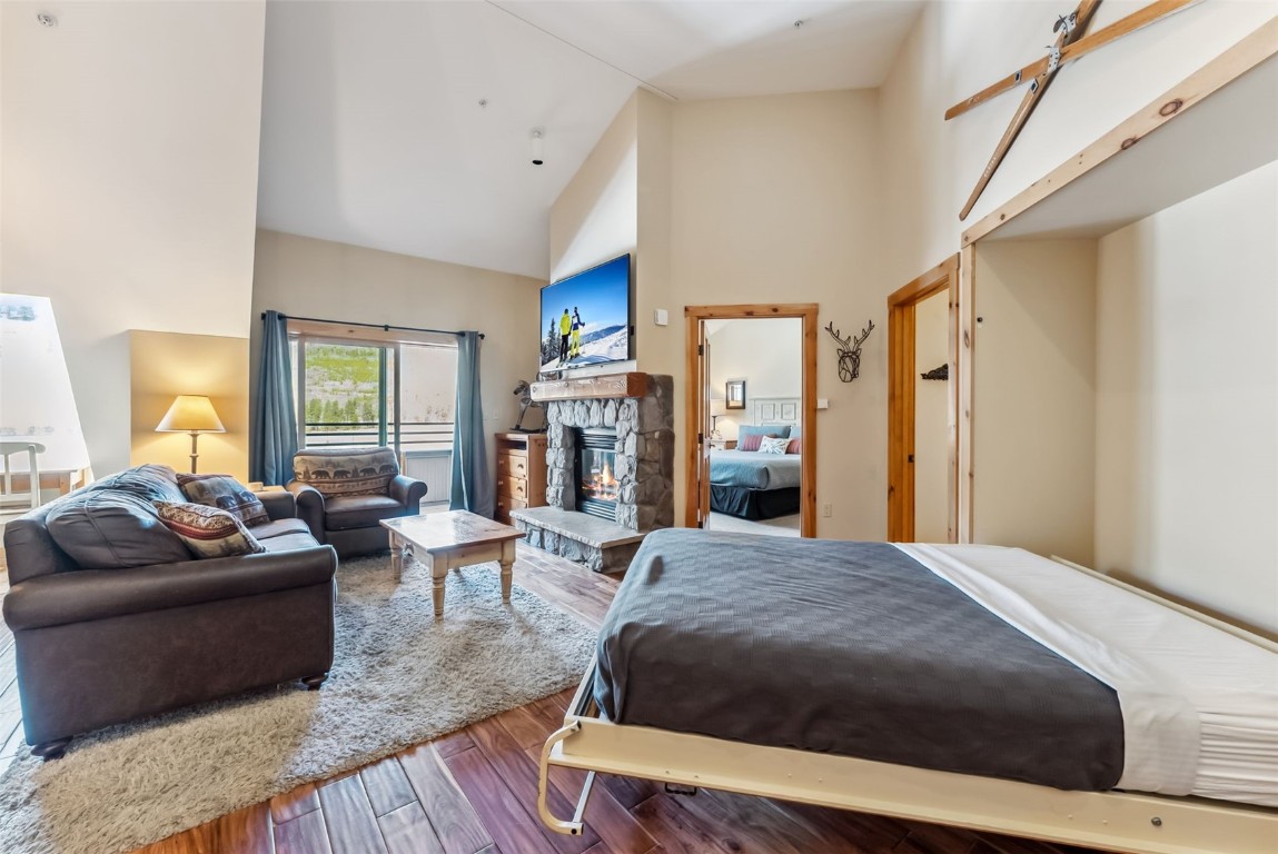 150 Dercum Square, Unit 8530 Keystone, CO 80435 - Photo 4 of 35 a bedroom with a large bed couch and a window