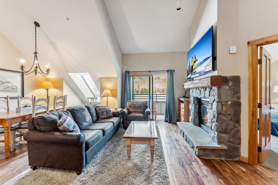 150 Dercum Square, Unit 8530 Keystone, CO 80435 - Photo 6 of 35 a living room with furniture fireplace and a flat screen tv