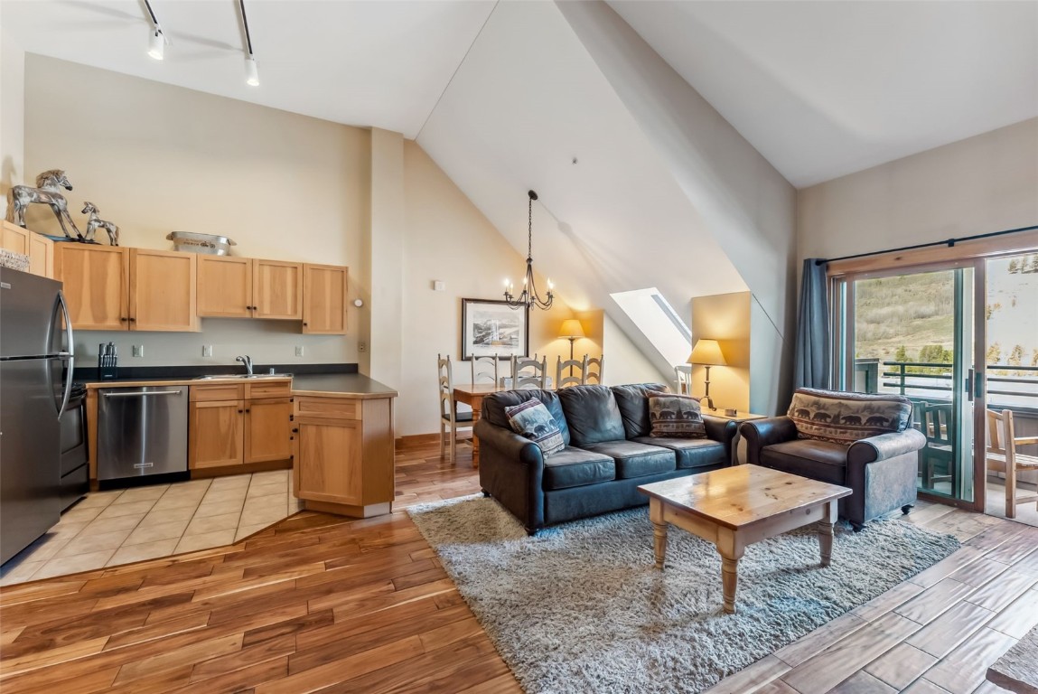 150 Dercum Square, Unit 8530 Keystone, CO 80435 - Photo 8 of 35 a living room with granite countertop furniture and kitchen view