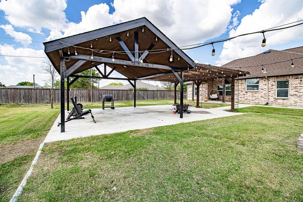 328 Meadow Lane Red Oak, TX 75154 - Photo 33 of 35 View of community featuring a patio area, a fenced backyard, and a pergola