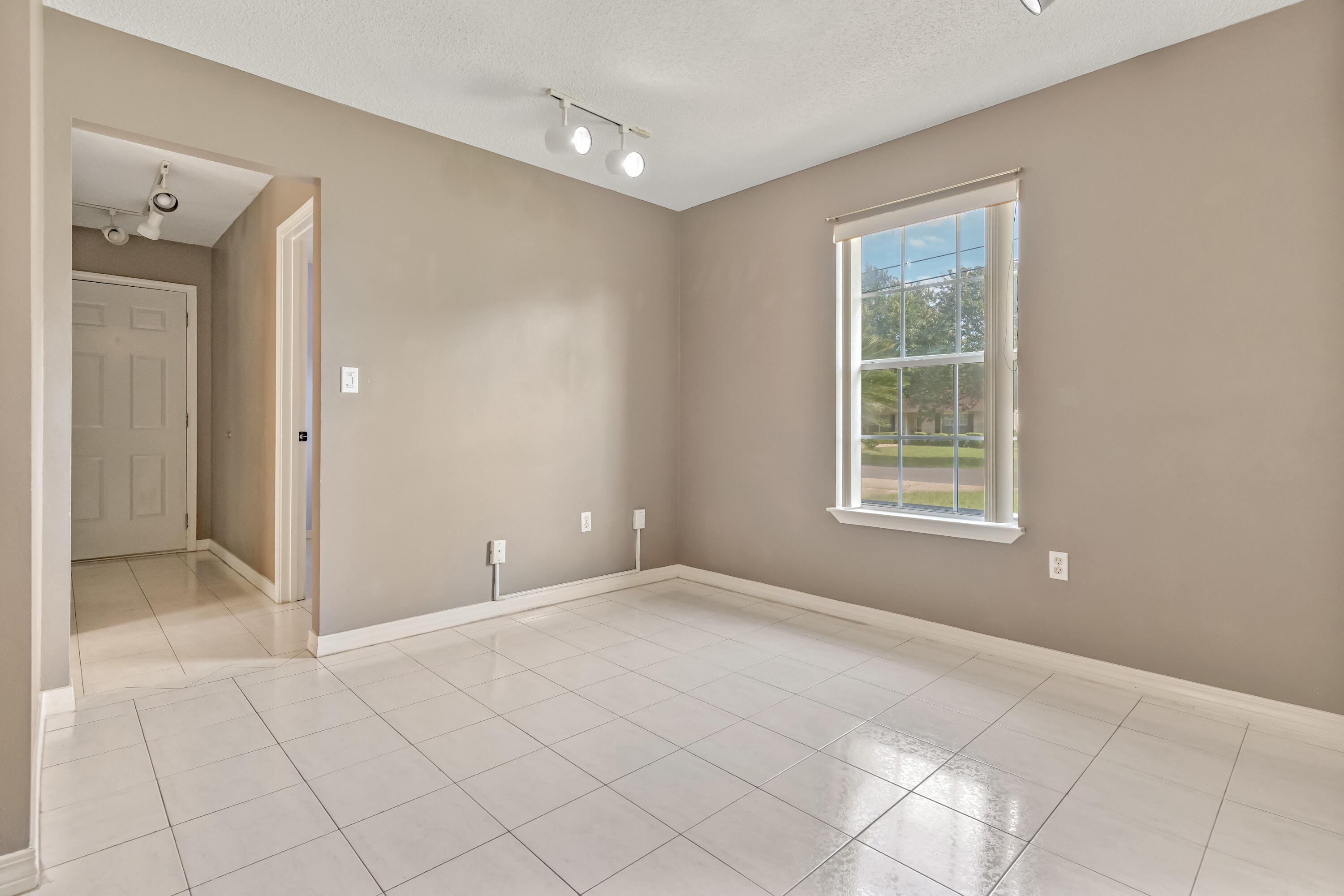 1249 Jefferyscot Drive Crestview, FL 32536 - Photo 11 of 40 an empty room with windows and closet