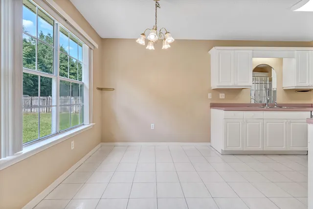 a view of a kitchen with a sink