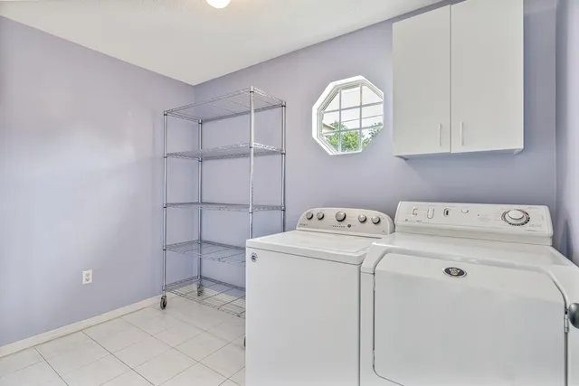 a view of a storage & utility room with washer and dryer
