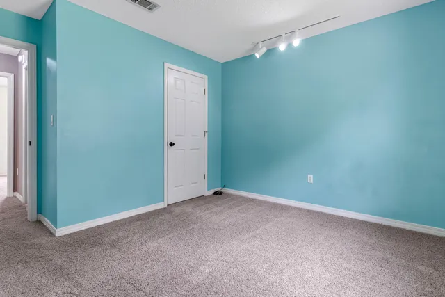 an empty room with closet