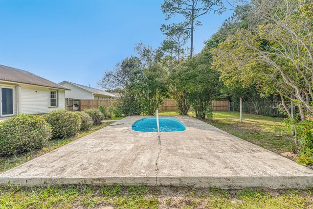 a house view with a backyard space