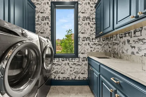 a view of a utility room with washer and dryer