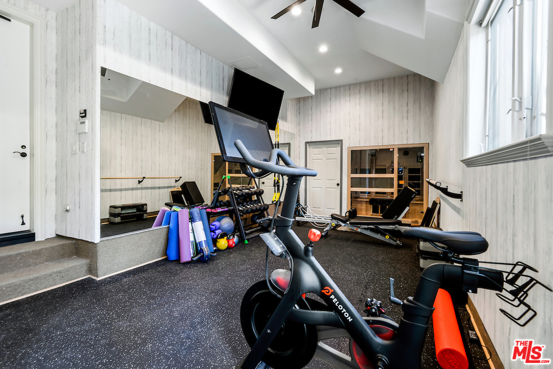 3316 Clerendon Road Beverly Hills, CA 91423 - Photo 27 of 53 a view of a room with gym equipment