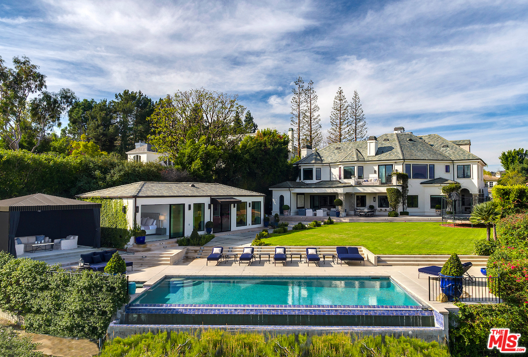 3316 Clerendon Road Beverly Hills, CA 91423 - Photo 47 of 53 a view of a house with swimming pool yard and patio