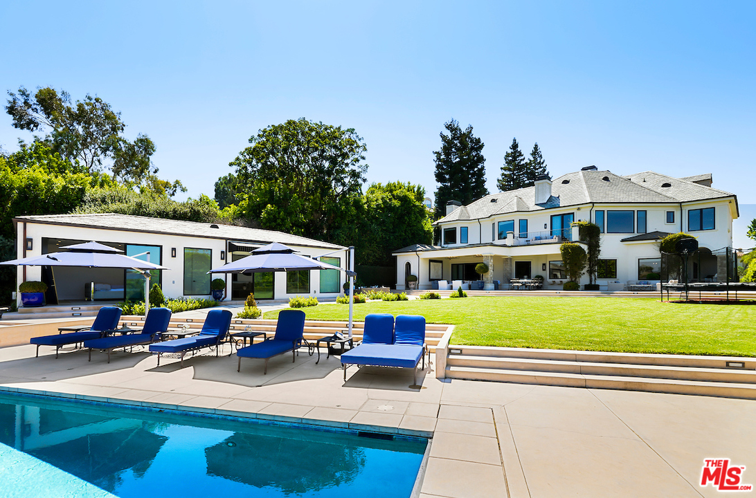 3316 Clerendon Road Beverly Hills, CA 91423 - Photo 48 of 53 a front view of residential houses with yard and outdoor seating