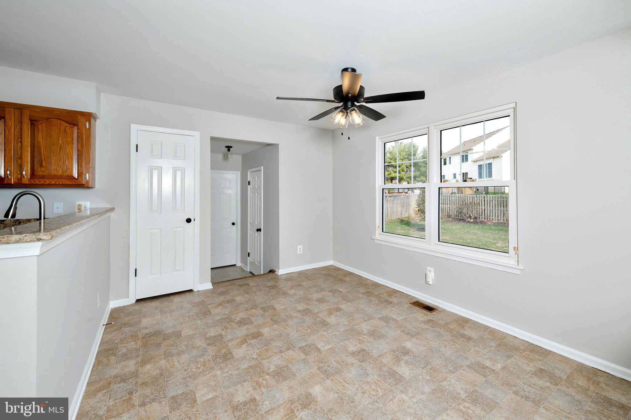 3 Patrick Henry Drive Marlton, NJ 08053 - Photo 12 of 41 a view of a livingroom with a ceiling fan and window