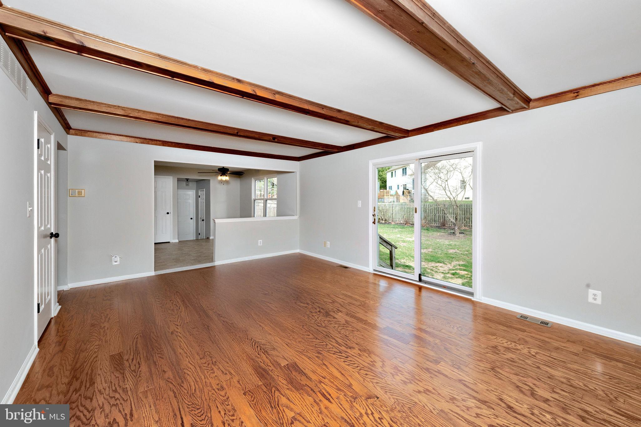 3 Patrick Henry Drive Marlton, NJ 08053 - Photo 16 of 41 a view of an empty room with wooden floor and a window