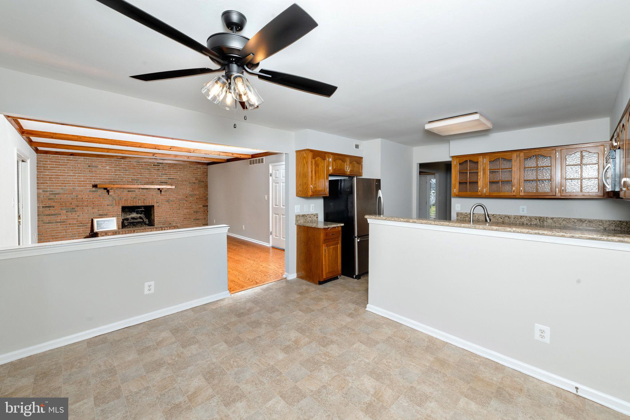 3 Patrick Henry Drive Marlton, NJ 08053 - Photo 18 of 41 a kitchen with stainless steel appliances kitchen island a refrigerator sink and white cabinets