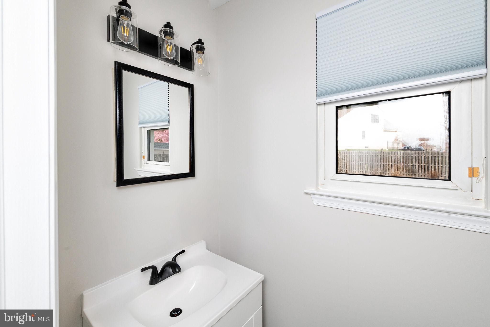 3 Patrick Henry Drive Marlton, NJ 08053 - Photo 19 of 41 a bathroom with a sink and a window
