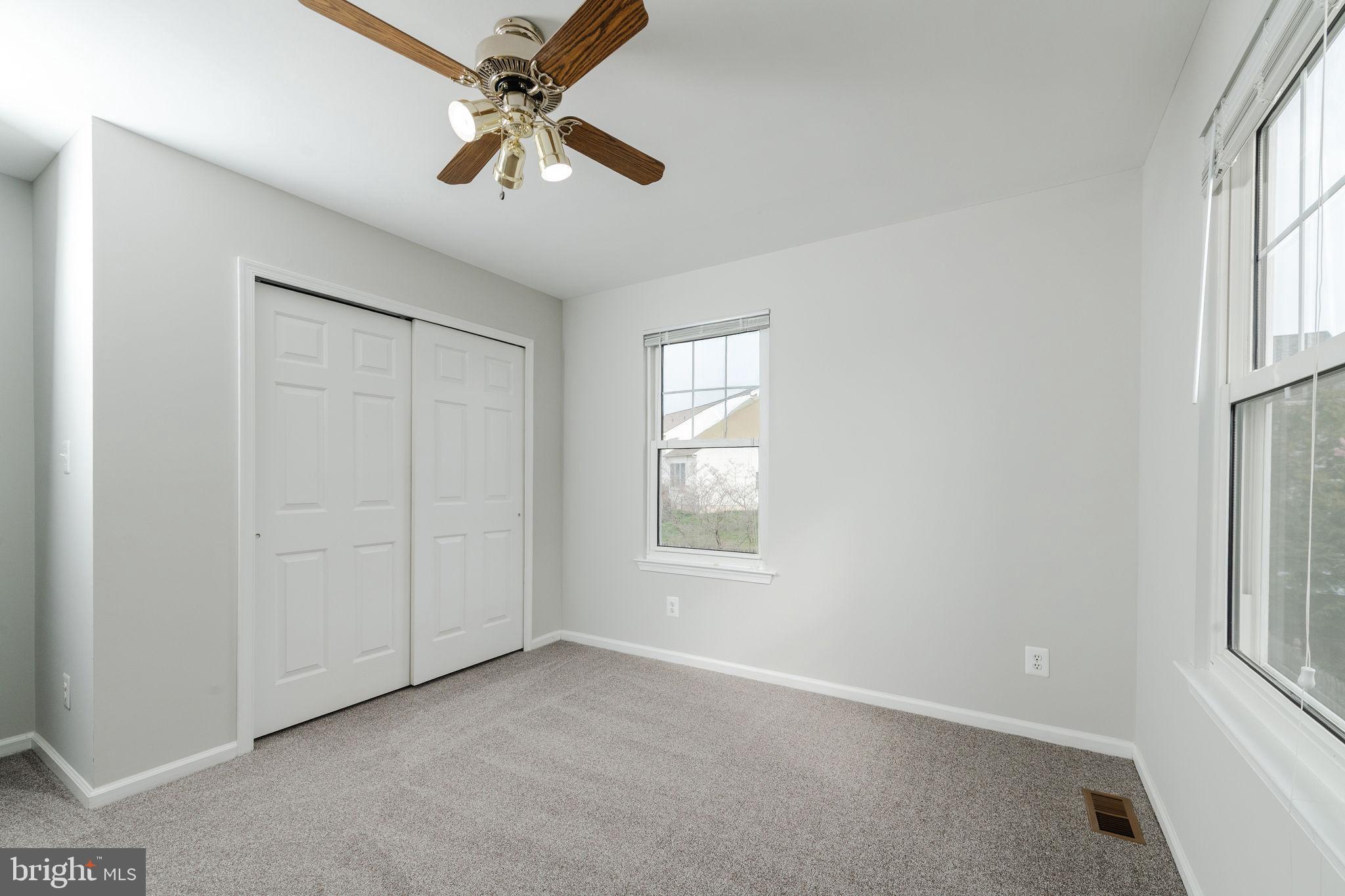 3 Patrick Henry Drive Marlton, NJ 08053 - Photo 25 of 41 an empty room with windows and fan