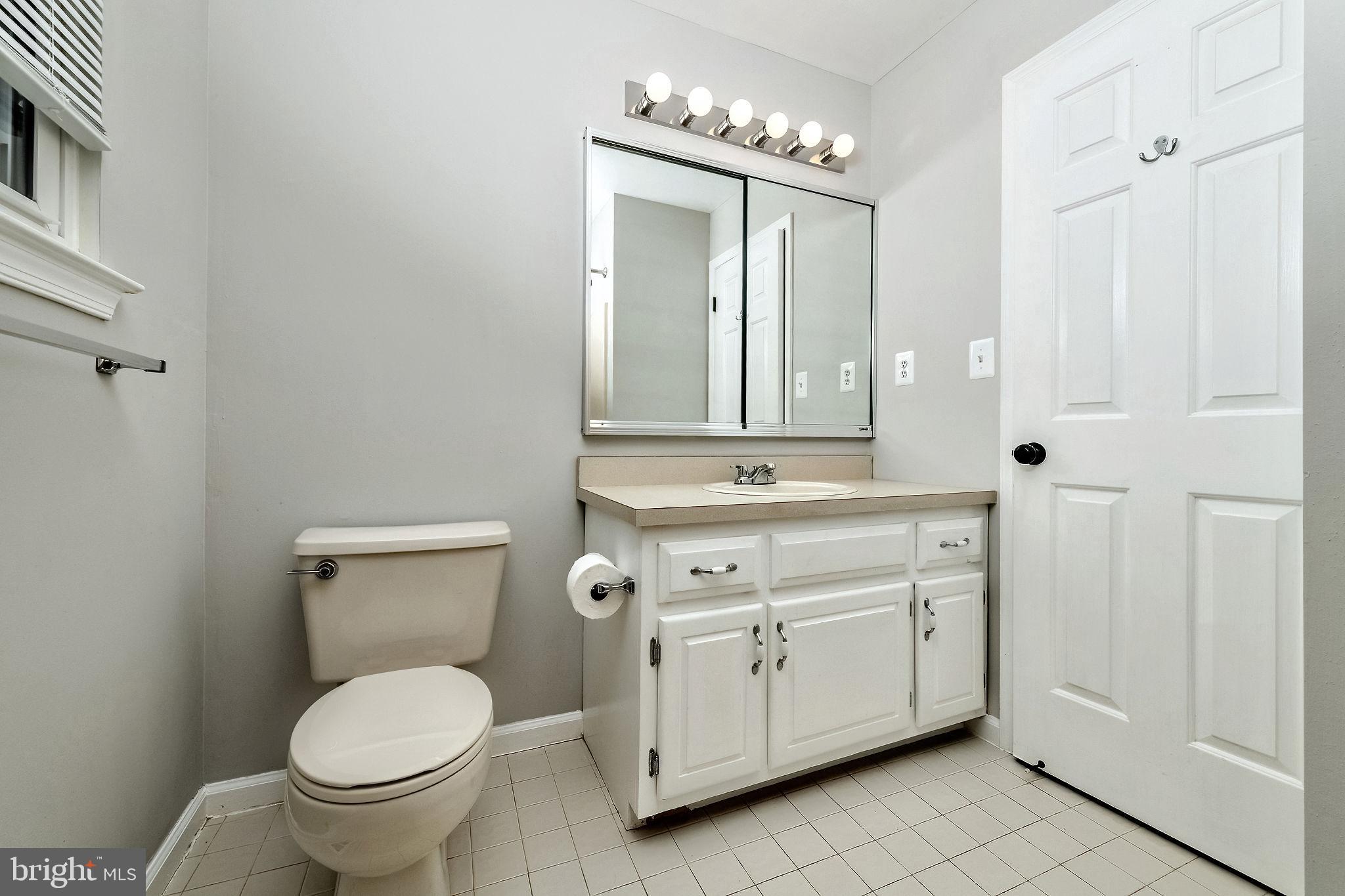 3 Patrick Henry Drive Marlton, NJ 08053 - Photo 27 of 41 a bathroom with a toilet sink and mirror