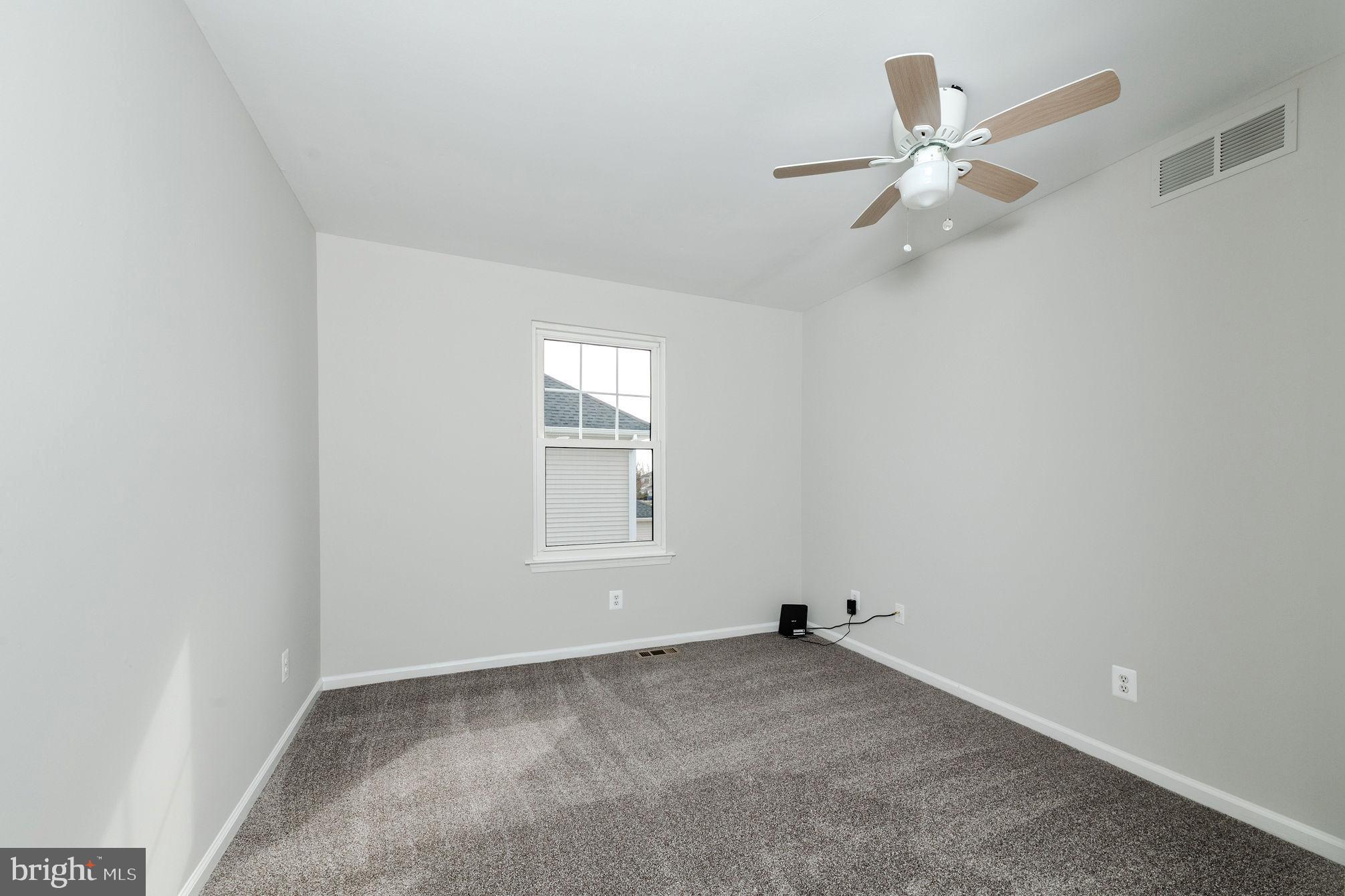 3 Patrick Henry Drive Marlton, NJ 08053 - Photo 28 of 41 an empty room with windows and fan