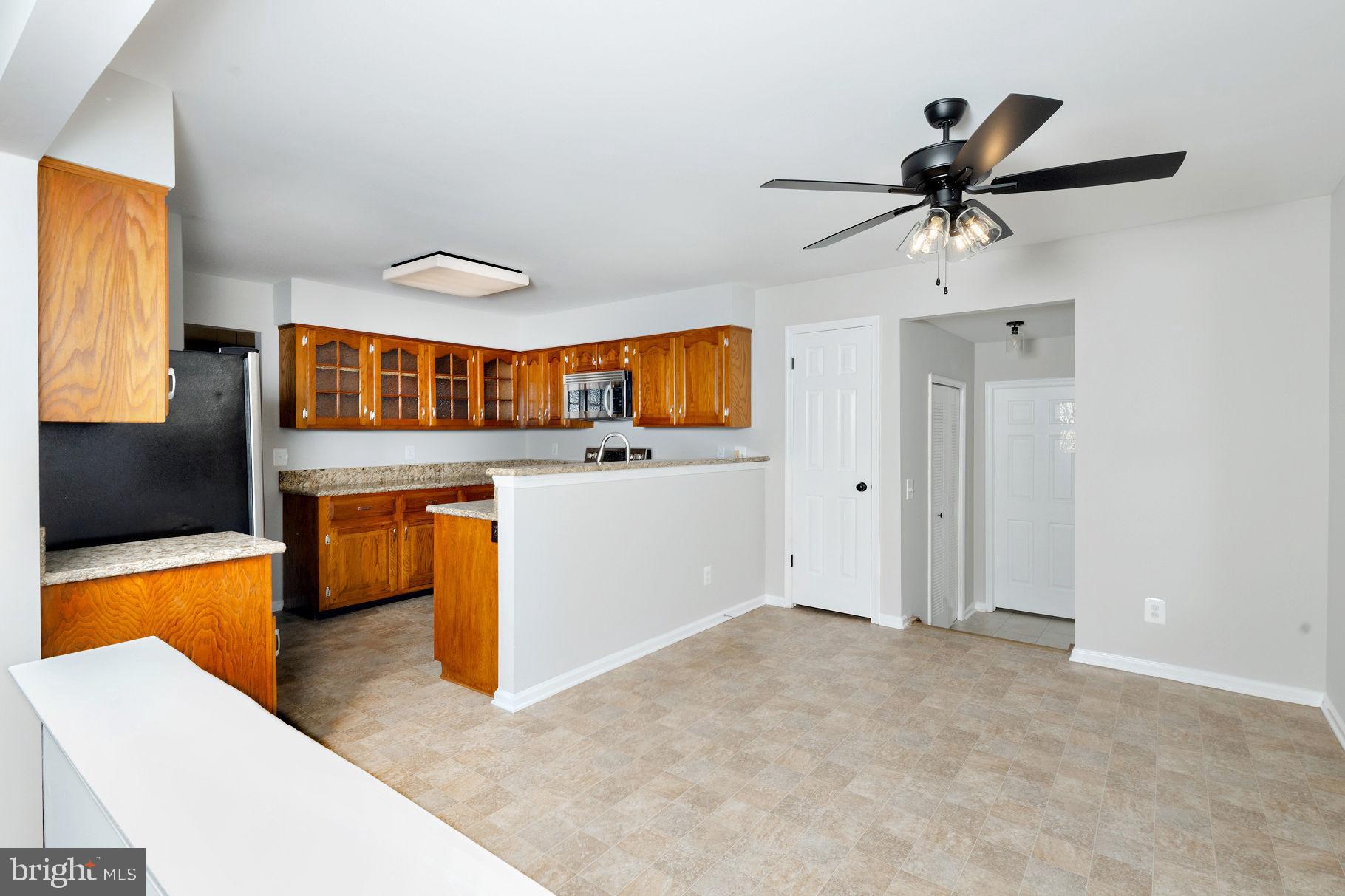 3 Patrick Henry Drive Marlton, NJ 08053 - Photo 9 of 41 a view of a kitchen with a sink and cabinet