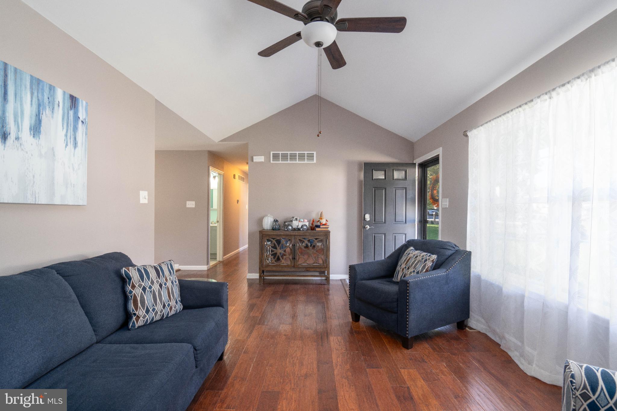 1249 Sassafras Drive Vineland, NJ 08360 - Photo 7 of 34 a living room with furniture and a wooden floor