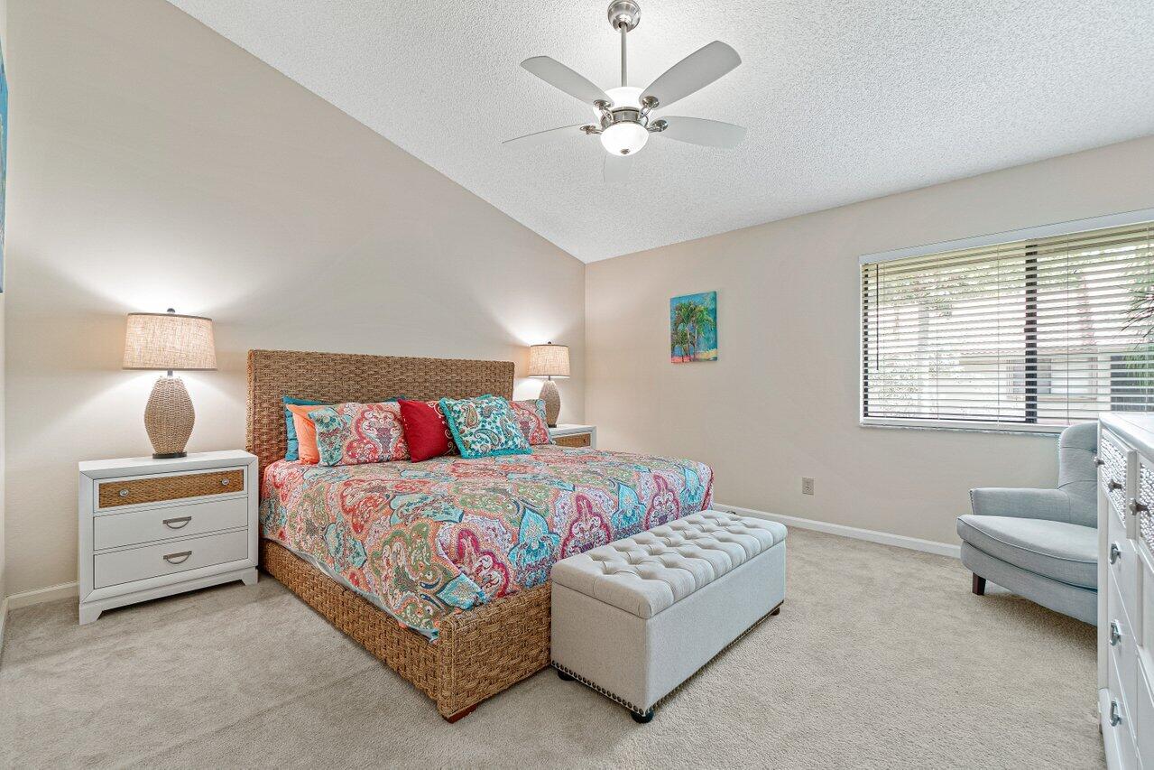 5690 Coach House Circle, Unit G Boca Raton, FL 33486 - Photo 15 of 33 PRIMARY BEDROOM WITH SOARING CEILINGS