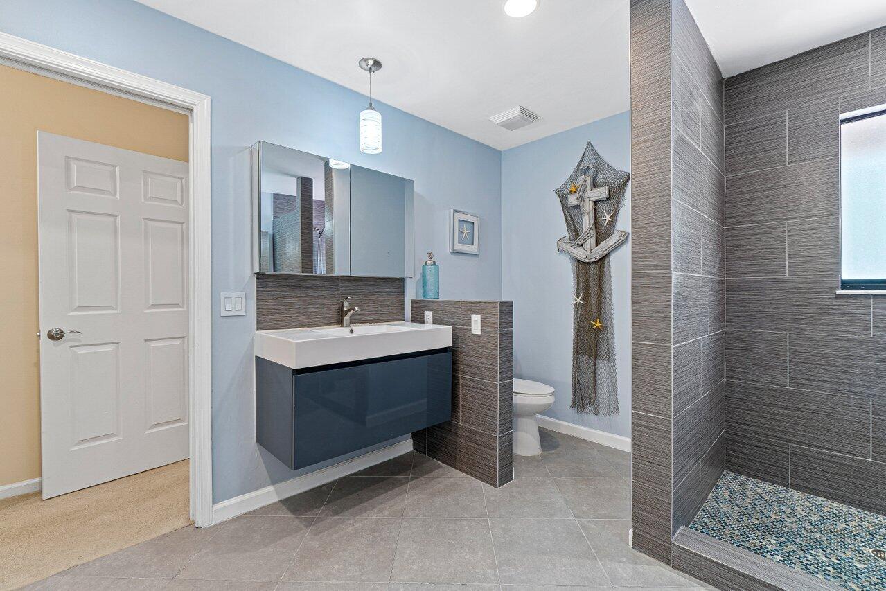 5690 Coach House Circle, Unit G Boca Raton, FL 33486 - Photo 17 of 33 REDESIGNED PRIMARY BATH
