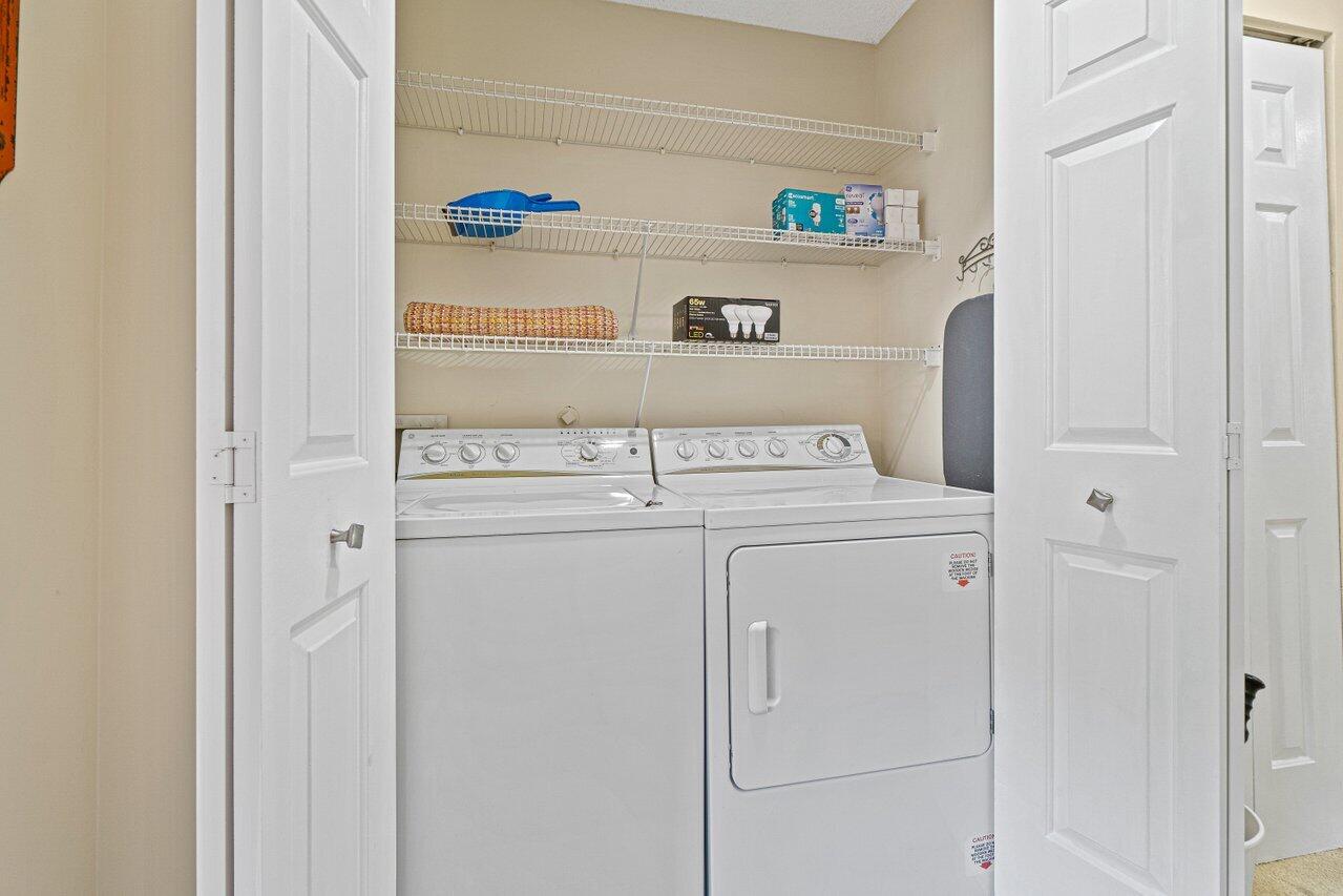 5690 Coach House Circle, Unit G Boca Raton, FL 33486 - Photo 23 of 33 LAUNDRY CLOSET