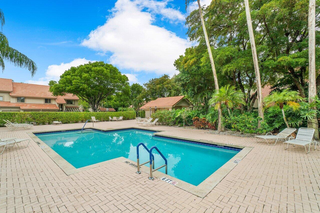 5690 Coach House Circle, Unit G Boca Raton, FL 33486 - Photo 27 of 33 EAST POOL