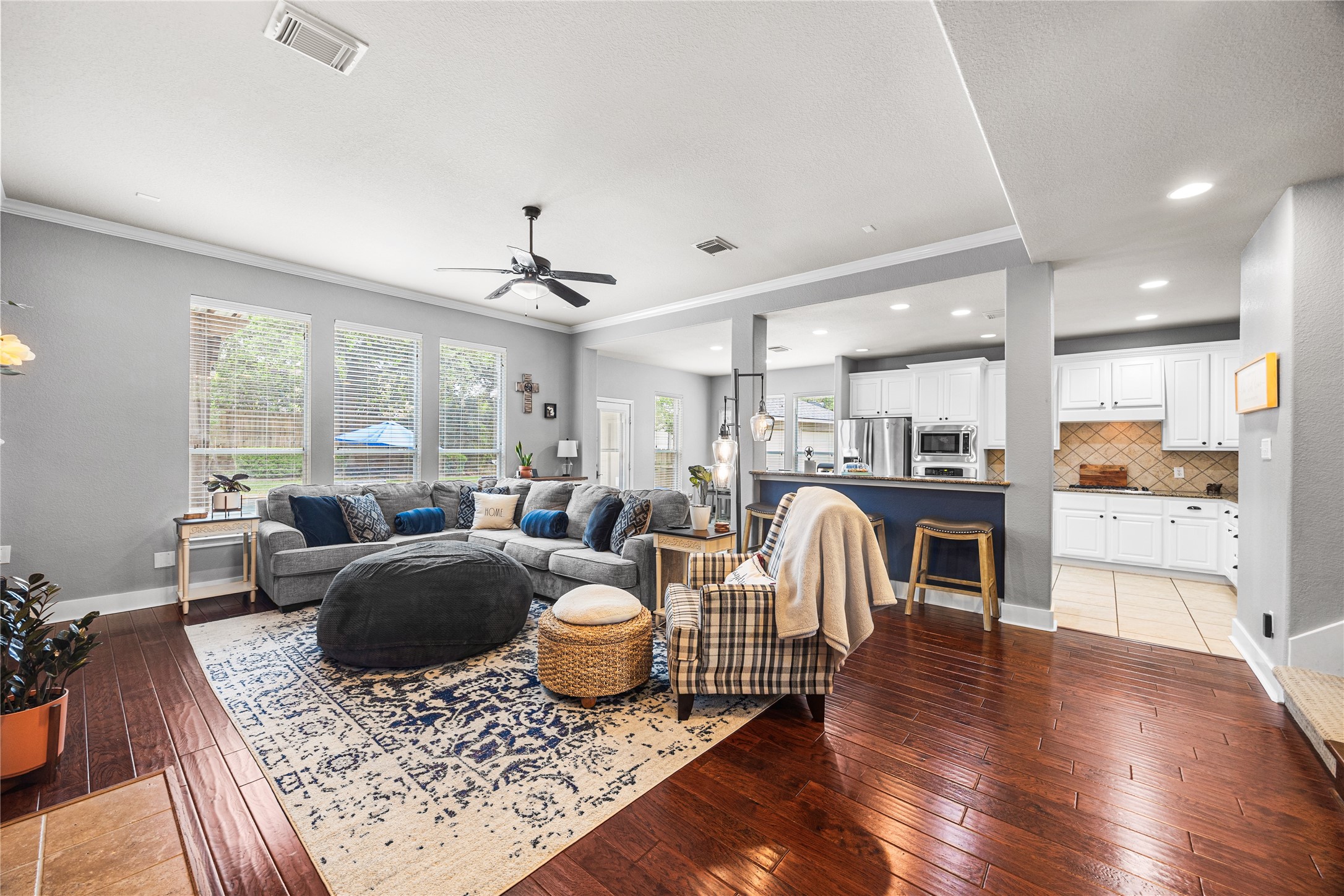 2167 Summit Mist Drive Conroe, TX 77304 - Photo 17 of 34 a living room with furniture and wooden floor